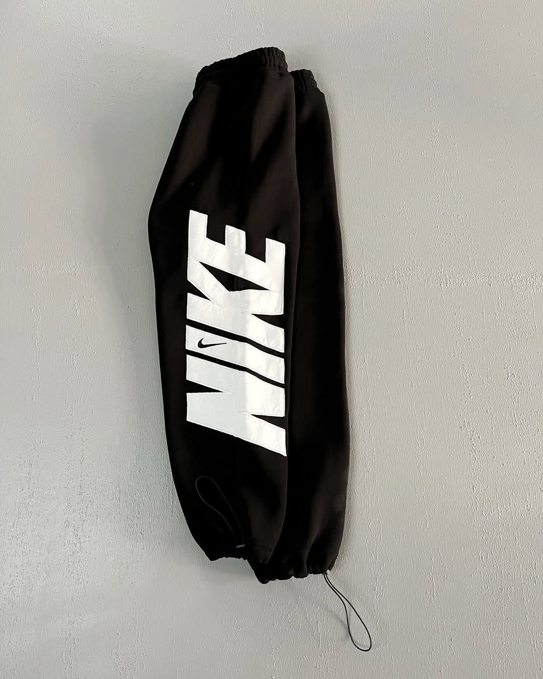 BAGGY NIKE A COTÉ
