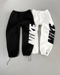 BAGGY NIKE A COTÉ
